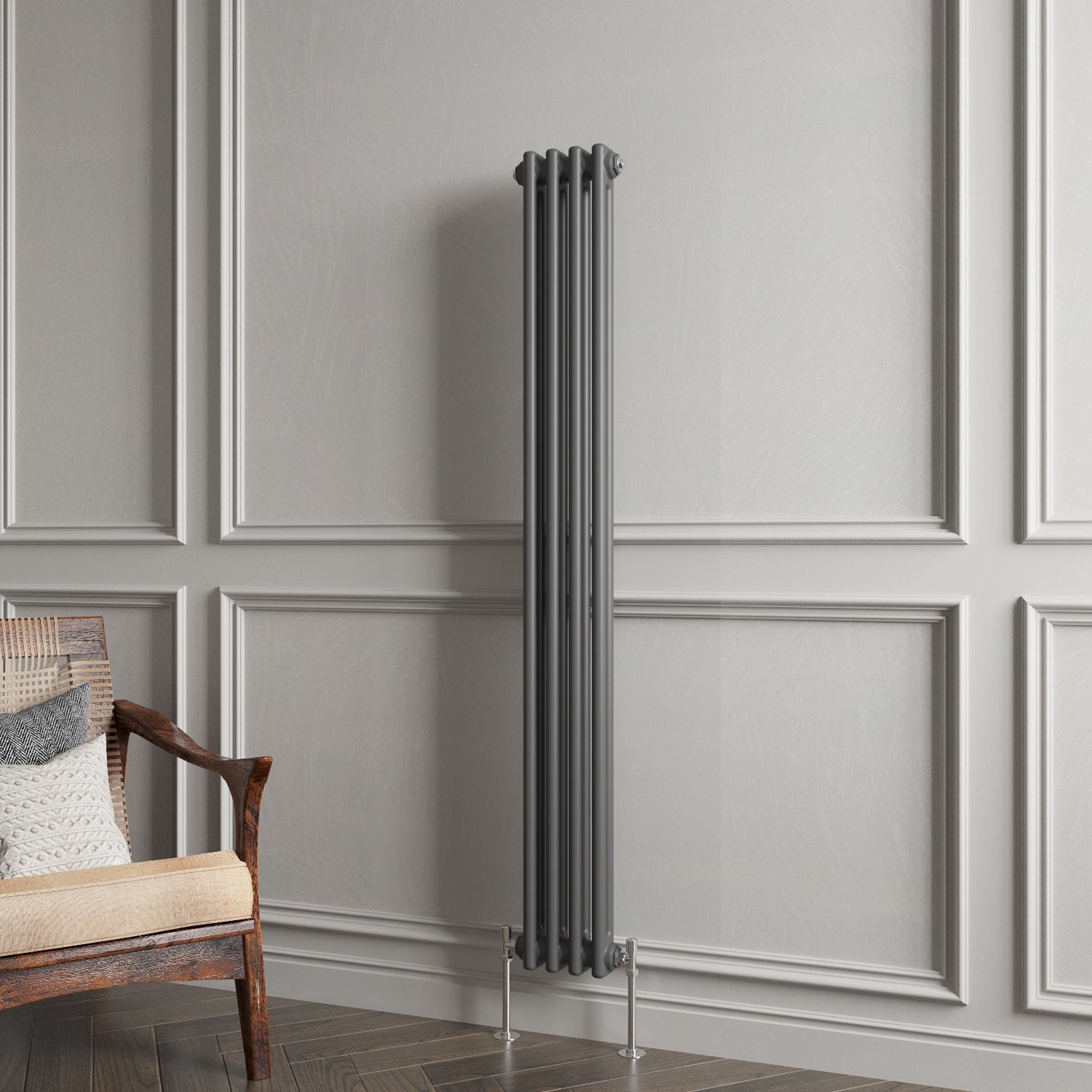 Vertical radiator against a gray paneled wall with a wooden chair.