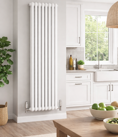 White vertical radiator in a modern kitchen with a wooden table and greenery. round panel. desginer panel radiator.