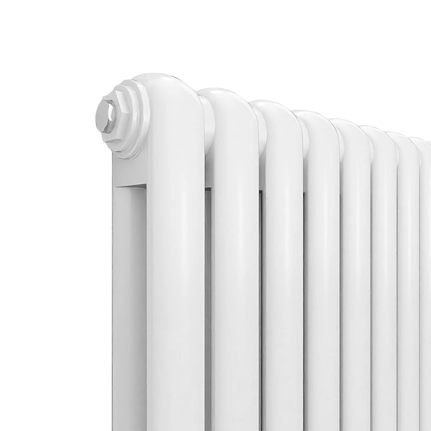 White radiator on a white background new deisgner iron cast column
